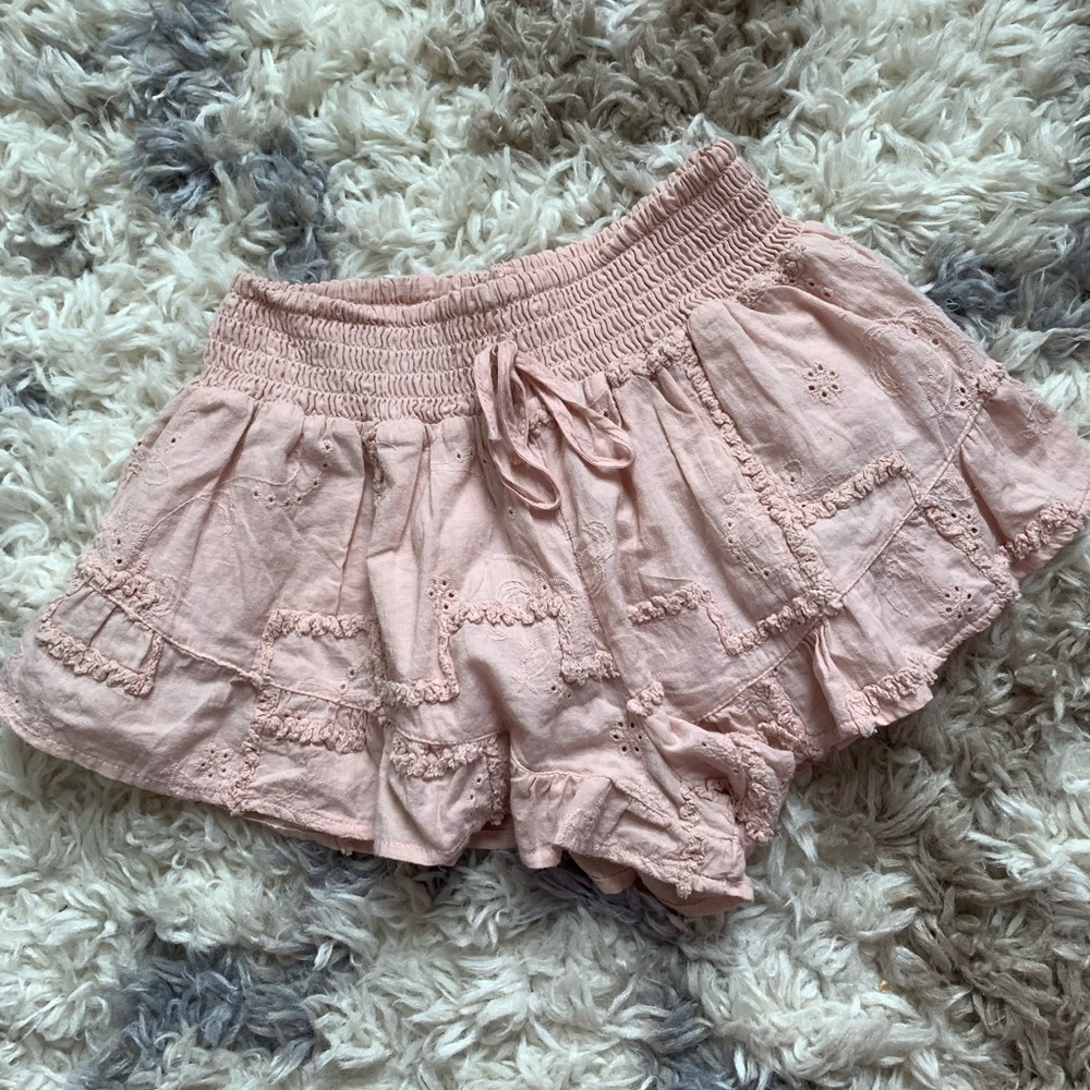 pink short ruffled shorts